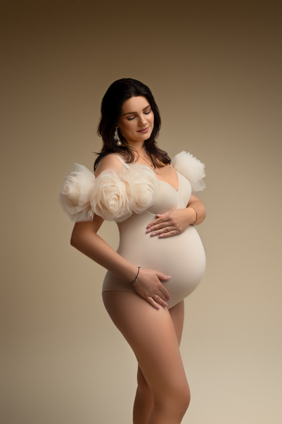 elegant pregnancy bodysuit with floral shoulder details
