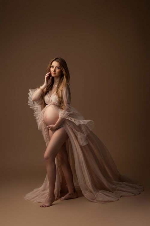 Coral in beige. A unique photography gown designed to create spectacular movement in photos. Perfect for maternity sessions, outdoor portraits and beach photoshoots.