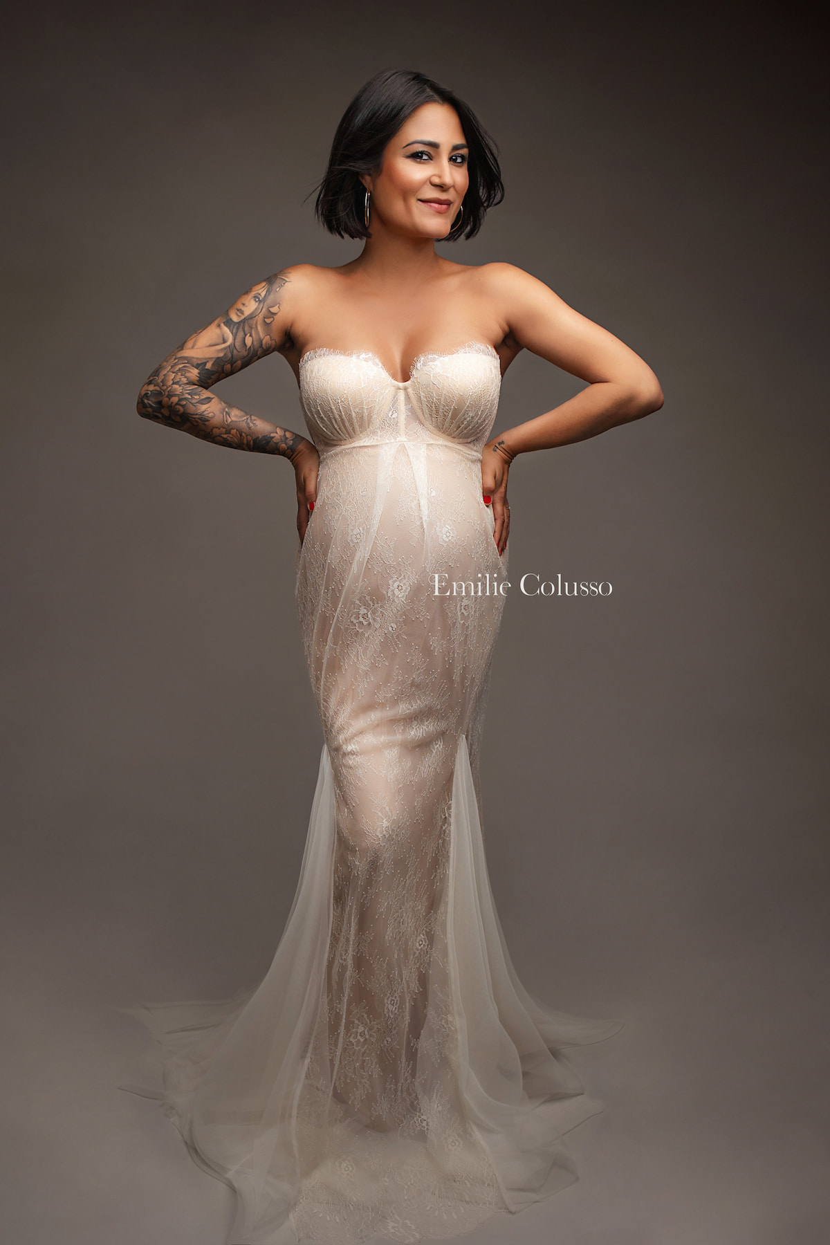 Lace gown Edwina in light beige. Elegant boho maternity dress designed for professional photoshoots. The flowing skirt creates beautiful movement in wind and motion, making it perfect for artistic and outdoor photography.