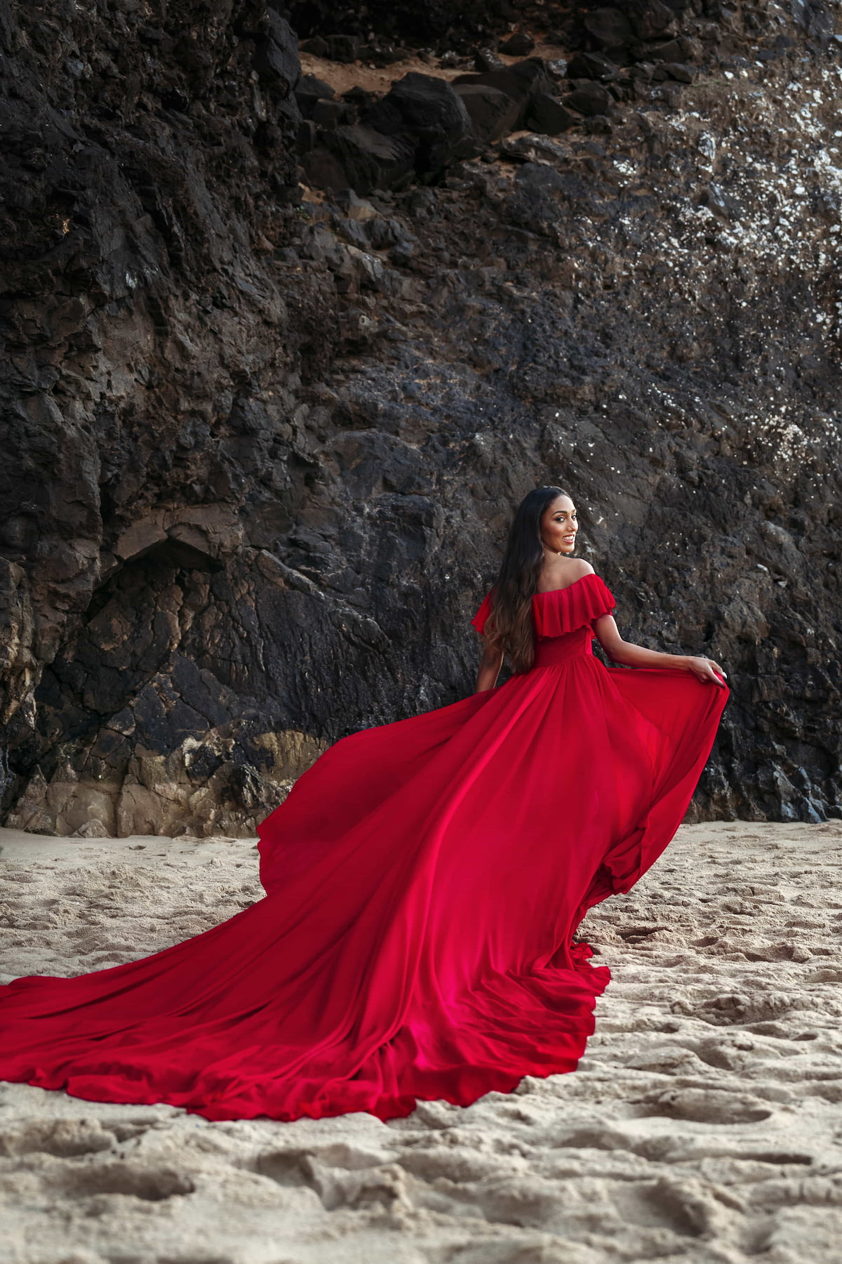 dramatic red flying dress Lanzarote Kamaprops maternity photography