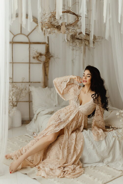 Boho lace rdess Hera in beige. This romantic maternity gown is designed especially for photographers and maternity sessions. The lightweight fabric drapes beautifully and creates a stunning effect in motion.