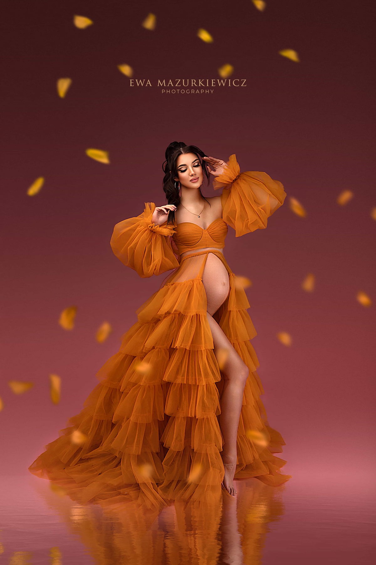 maternity photoshoot gown with layered ruffle skirt