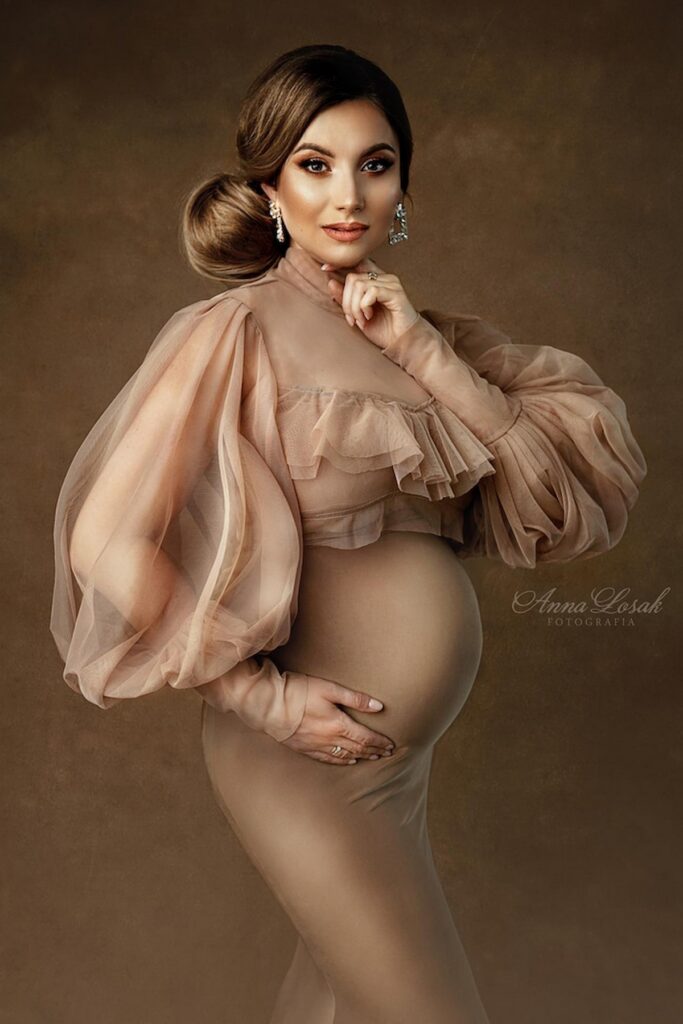 Maternity photoshoot with sheer tulle top and high neckline